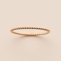 This is a great texture piece. It makes any stack more versatile and beautiful. This twisted look will be great with the solid band or birthstone. Details:Location: Finger (order larger or smaller sizes depending on which finger you choose to wear it)Thickness: 1mmSizes: 5,6,7,8Style: Minimalist/DaintyMade with: 14K Gold Filled Lauren Johnson, Rings Minimalist, Dainty Rings, Twist Ring, Minimalist Ring, Minimalist Rings, Dainty Ring, Stackable Rings, Stacking Rings