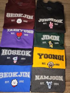 BTS/BT21 name, and BT21 character embroidered on 100% cotton Champion T-shirt Cotton T-shirt With Letter Embroidery For College, Black Cotton T-shirt With Letter Embroidery, Streetwear T-shirt With Letter Embroidery And Crew Neck, Fan Apparel Cotton T-shirt With Embroidered Graphics, Fan Apparel T-shirt With Embroidered Graphics And Crew Neck, Fan Apparel T-shirt With Embroidered Graphics, College Fan Apparel T-shirt With Embroidered Graphics, Letter Embroidery Crew Neck T-shirt For Streetwear, Streetwear T-shirt With Letter Embroidery