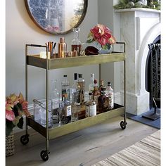 an image of a bar cart with bottles on it