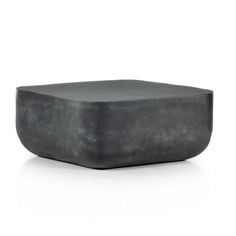 a black square stool on a white background