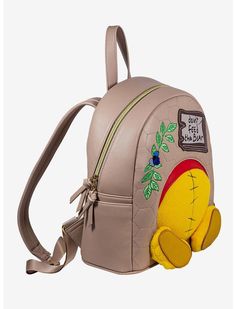 Product ID: 13327982 Danielle Nicole Disney Winnie the Pooh Don't Feed the Bear Mini Backpack You can't feed the bear, but you can stuff this mini backpack from Danielle Nicole with whatever you want! Pooh Bear has eaten too much hunny and has gotten himself stuck again. His little feet stick out on the front of this bag with a his head poking out in a graphic on the reverse side. The front also features embroidered and die-cut details, like a flower, a "Don't Feed the Bear" sign, and a honeycom Eeyore Teddy Bear With Tags Disney Store, Loungefly Mini Backpack Boxlunch, Winnie The Pooh Handbag, Boxlunch Bags, Cheshire Cat Disney, Dont Feed The Bears, Lounge Fly, Loungefly Purse, Danielle Nicole Disney