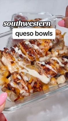 someone is holding up a glass dish with chicken and cheese in it that says southwestern queso bowls