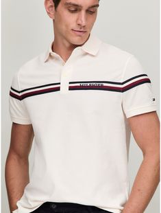 Tommy Hilfiger men's polo. What we do best, our athletic pique cotton polo, cut in an easy fit, featuring our knit signature stripe with the Hilfiger monotype logo.  Material: 100% Transitional Cotton ,  In-conversion. Classic Tommy Hilfiger Collared Polo Shirt, Polo Tommy Hilfiger Men, Tommy Hilfiger Cotton Polo Shirt, Tshirt Polo, Tommy Hilfiger Polo Shirt, Cotton Polo T-shirt With Contrast Collar, New Product Development, Tommy Hilfiger Cotton Logo T-shirt, Logo Material