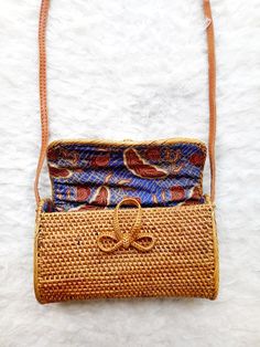 All of our rattan, ata and straw bags are handmade and therefore some bags may have slight variations in design, size, colour and hardware/ fastenings. This is a natural occurrence in handcrafted goods. Due to the handcrafted nature, no two designs will be exactly alike. Traditional Straw Bag With Adjustable Strap For Everyday, Brown Crossbody Straw Bag With Bamboo Handle, Traditional Straw Bag With Adjustable Strap For Travel, Traditional Straw Bag For Everyday Use, Traditional Straw Bags For Travel, Rectangular Rattan Bag With Adjustable Strap, Traditional Summer Shoulder Bag With Bamboo Handle, Traditional Rectangular Bag In Natural Fiber, Traditional Rectangular Bag Made Of Natural Fiber