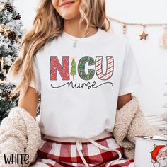 NICU Nurse Christmas Shirt,  Christmas NICU Nurse T-Shirt, Neonatal ICU Nurse Gift, Hospital Xmas Party Tee, Nicu Crew TShirt Nurse Christmas  If you are looking for soft, well designed, and comfy t -shirts, you have come to the right place! We strive to provide beautiful shirts for all occasions as well as a great customer experience. If you have any questions about our shirts, please feel free to shoot us a message anytime. We try our best to message everyone back within 24 hours. Product Deta Cute White Christmas T-shirt, Cute White Christmas Tops, Cute Red Winter T-shirt, Cute Red T-shirt For Winter, Cute Christmas T-shirt With Letter Print, Festive White T-shirt With Letter Print, Cute Letter Print T-shirt For Holiday, Nurse Christmas, Nicu Nurse