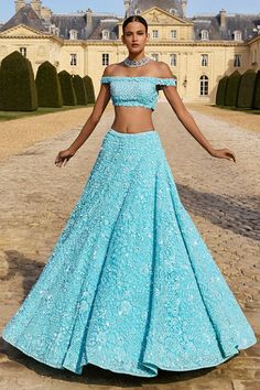 This lehenga set features intricate tonal sequin, beads and crystal embroidery. The blouse has a plunging neckline and comes with four sided embroidered net dupatta.From Seema Gujral's Love Notes From Paris Collection DELIVERY TIMEPlease allow 8-12 weeks for your outfit to arrive. FABRIC DETAILSNet Professional cleaning only. Sky Blue Lehenga, Marriage Clothes, Sequin Lehenga, Seema Gujral, Chikankari Lehenga, Mirror Work Lehenga, Organza Lehenga, Crystal Embroidery, Blue Lehenga