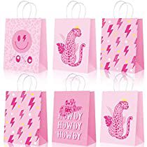 pink shopping bags with designs on them and the words baby, howdy, happy