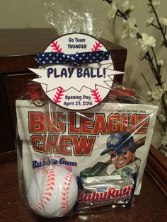 some baseballs and other sports items on a table