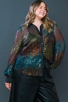 Slip into the Cause A Commotion Sequin Blouse to add a touch of elegance to your wardrobe. This blouse features a classic shirt collar, long sleeves, button down front and cami underlay. The sequins will help create a dazzling statement to any outfit. Details Self : 95% Polyester 5% Spandex Contrast : 100% Polyester Lining : 100% Polyester Size & Fit - Model is 5`8" And Wearing Size Small - Measurements Taken From Size Small - Approx. Length: 24" Contrast Sequin Long Sleeve Tops For Fall, Long Sleeve Tops With Contrast Sequin For Fall, Button-up Sequin Blouse For Party, Collared Shirt For Fall Party, Sequin Button-up Blouse For Night Out, Glamorous Button-up Party Blouse, Glamorous Button-up Blouse For Night Out, Long Sleeve Shirt For Night Out Party Season, Long Sleeve Shirt For Fall Party