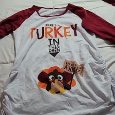 Maternity Thanksgiving Shirt, Can Be Worn W Tights Of As A Dress. "There's A Turkey In This Oven." Is Cute. Size M 17" P2p This Is Brand New, Nvr Worn. Got Out Of A Bin We Purchased. Color Is Burgundy On Long Sleeves. Maternity Thanksgiving Shirt, Thanksgiving Pregnancy Shirt, Thanksgiving Shirt, Thanksgiving Shirts, Red White, Red And White, Long Sleeve Tees, Oven, Tights