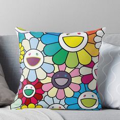 a colorful flower pattern on a white background throw pillow