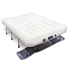 the air mattress is sitting on top of an inflatable bed with two legs