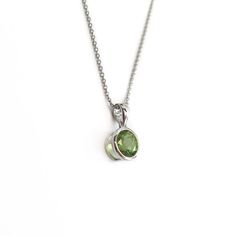 14k Solid White gold Peridot gemstone pendant. Brilliant round cut Peridot Peridot gemstones are found in Burma and South America and is the birthstone for the month of August. Chain is optional August Month, Month Of August, Peridot Pendant, Peridot Gemstone, Gemstone Pendant, South America, Pendant Necklaces, Round Cut, Birthstone