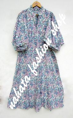 "ITEM DESCRIPTION Features: 3/4th sleeve, V neck, Long dress Material: Cotton cambric Fabric: 100% cotton soft light weight ethnic print fabrics  Sleeve Length = 18 inch For more sizes & their measurement, please refer our below chart to understand the sizes variations available with us For your size requirement, please mention your size in seller note at the time of buying. SIZE MEASUREMENT  BUSTLENGTHSHOULDER XXS34 inch51 inch13.5 inch XS36 inch51 inch14 inch S38 inch51 inch14.5 inch M40 inch5 Bohemian Half Sleeve Cotton Maxi Dress, Bohemian Half-sleeve Cotton Maxi Dress, Button Maxi Dress, Bohemian Floor-length Floral Print Kaftan, Patterned Paisley Print V-neck Maxi Dress, Spring Paisley Print Boho V-neck Dress, Multicolor V-neck Maxi Dress With Paisley Print, Multicolor Floral Print V-neck Sleepwear, Ethnic Print