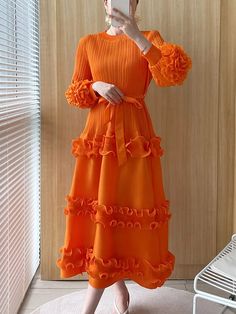 40793080987709 Orange Midi-length Dress With Ruffles, Orange Ruffled Midi Dress, Orange Midi Dress With Ruffles, Pleated Orange Maxi Dress For Spring, Orange Pleated Midi Dress For Spring, Chic Orange Pleated Midi Dress, Spring Orange Pleated Maxi Dress, Spring Dresses With Pleated Hem For Brunch, Modest Spring Party Dresses