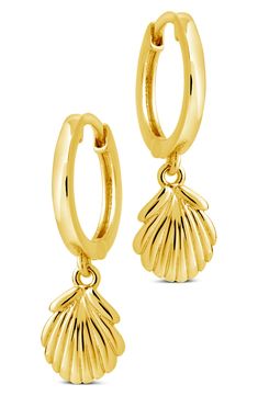 A timeless hoop is updated with clamshell-designed charm that dangles to enhance the contemporary charm of these gleaming drop earrings. 1/2" hoop diameter; 3/8" charm Hinge with snap-post closure 14k-gold plate Imported Small Hoop Huggie Earrings With Charms, Gold Hoop Jewelry With Lobster Clasp, Elegant Shell-shaped Gold Hoop Earrings, Gold-plated Shell-shaped Earrings, Gold Shell-shaped Hoop Earrings, Gold Plated Shell-shaped Earrings, Shells, Gold Plate, Hoop Earrings