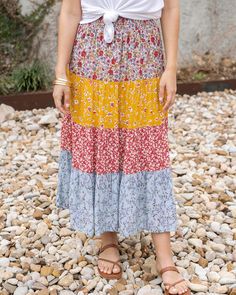 Flowy Patchwork Tiered Maxi Skirt, Flowy Tiered Patchwork Maxi Skirt, Relaxed Tiered Patchwork Skirt, Flowy Midi Skirt With Patchwork, Casual Long Skirt With Floral Patchwork, Flowy Tiered Patchwork Skirt, Casual Multicolor Floral Patchwork Skirt, Spring Patchwork Tiered Maxi Skirt, Casual Tiered Patchwork Skirt