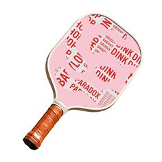 a pink ping pong paddle with words on it