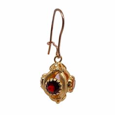 This is part of Chairish’s Fine Jewelry assortment.  Fine pair of Victorian Etruscan style dangle pierced earrings. The earrings are in charm form, set with 4 semi-precious stones which include citrine, aquamarine, amethyst, and garnet. The bezels have Etruscan style beadwork and filigree finials at the bottom. The earrings have French wires and hooks for pierced ears. The earrings test 14K but have no marks. Condition is excellent.   Dimensions- Length including wires: 1 1/2”; Width: 1/2”; Weig Luxury Jeweled Drop Earrings, Ornate Gemstone Dangle Earrings, Luxury Jeweled Dangle Jewelry, Luxury Jeweled Earrings Gift, Ornate Jeweled Drop Earrings, Byzantine Style Pierced Drop Earrings, Victorian Jeweled Earrings Gift, Gold Jeweled Fine Jewelry Earrings, Yellow Gold Jeweled Drop Earrings