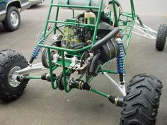 an off - road vehicle is parked in a parking lot