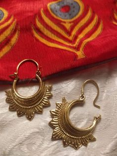 Handmade Earrings. Made from solid Brass. Do you have any questions, requests or comments? We'll be delighted to help you. Please feel free to contact us if you need any further information Brass Jewellery Handmade, Artistic Earrings, Brass Jewellery, Brass Hoop Earrings, Brass Hoops, Festival Jewelry, Ethnic Earrings, Earrings Hoop, Shiny Things