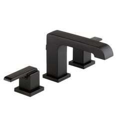 two black faucets with handles on each side and one in the middle, both are