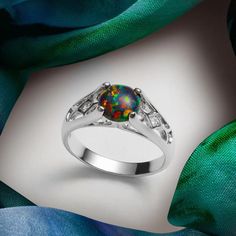 Turn some heads: This stunning Iridescent Black Hue Opal Ring are a true color statement. Polished Sterling Silver makes it easy to wear. Style SR11236 Iridescent Black, Eco Luxury, Opal Ring, Black Opal, Ring Sterling Silver, Opal Gemstone, Opal Rings, Jewelry Gift Box, Sterling Ring