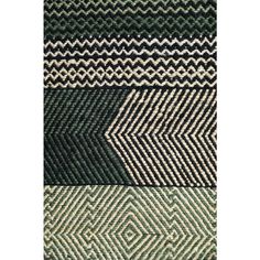 four different colored rugs with an arrow pattern on the bottom and one in green, white