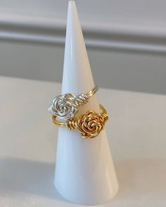 Wire wrapped rose rings! These are simple but elegant everyday rings. I make them to order so each ring is unique and made to your specific ring size. Elegant Adjustable Rose-colored Ring, Elegant Adjustable Flower Ring With Roses, Elegant Adjustable Rose Flower Ring, Adjustable Elegant Rings With Roses, Elegant Adjustable Rings With Roses, Elegant Adjustable Rings With Rose Details, Wire Rose Ring, Rose Rings, Wire Wrapped Rose