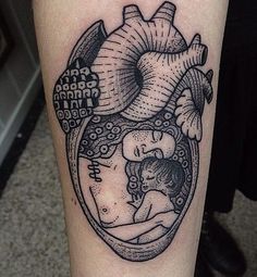 a black and white drawing of a heart with a child inside it on the leg