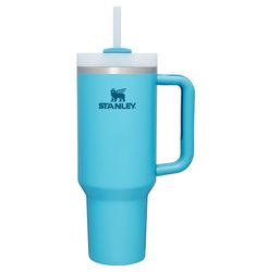 a blue travel mug with a straw sticking out of the lid and handle, on a white background