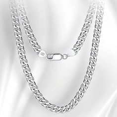 material: 925sterling silver  5mm  18inch  lobster claps  choker necklace  women/men  rhodium plated  sterling silver Cuban curb chain great quality, affordable pricing this chain is 24g a 5mm 18inch long chain it is rhodium as well to add extra shine to the silver.                             any further questions please contact me Cuban Necklace, Choker Chain, Silver Choker, Silver Gifts, Curb Chain, Fine Silver, Solid 925 Sterling Silver, Rhodium Plated, Chains Necklace