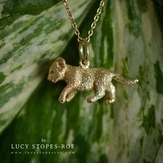 This cute little lion cub pendant is cast in sterling silver and finished by hand, created from Lucy's original hand-sculpted design. This necklace is also available plated in 18 carat gold, but bear in mind that plating can add 4-5 working days to the lead time. For an estimate on when you can expect to receive this please see the 'Delivery and Returns' section below, and the my 'Shop Policies' for shipping time estimates. If you are in a hurry then please message me for a more accurate idea of Lion Charm, Lion Jewelry, Lion Necklace, Lion Pendant, Taking A Bath, Wax Carving, Before Going To Bed, Lion Cub, Dog Pendant