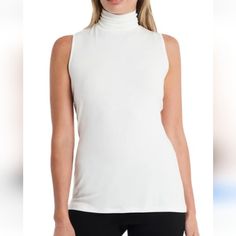 Nwt Vince Camuto White Sleeveless Turtleneck Top In New Ivory, Size L. Super Soft. Classic White Sleeveless Tank Top, Chic White Tank Top For Layering, White High Neck Tank Top For Spring, Versatile White Tank Top For Layering, Classic White Vest For Layering, Chic White Vest For Layering, White Sleeveless Turtleneck, Sleeveless Turtleneck Top, Jersey Style