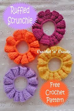 four crocheted scrunchies are shown in three different colors and sizes