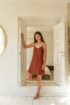 "TILDA cami dress in terracotta color. * A-line silhouette * V neckline * Without pockets DETAILS: * 100% European, pre-washed medium weight linen. * All pieces are made to order, if you need a special size, please leave a note when purchasing. SIZING & FIT This dress is true to size. Please check the finished dress measurements sizing table in the last photo or below in the listing before purchasing. * The model is 180 cm (5′11″) high, wearing size S. * Model measurements: bust 84 cm (33\") V-neck Slip Dress For Summer Loungewear, Casual V-neck Slip Dress For Sleep, V-neck Sundress For Loungewear, Linen V-neck Dress With Adjustable Straps, Summer V-neck Slip Dress For Sleep, V-neck Linen Dress With Adjustable Straps, Summer V-neck Slip Dress For Loungewear, Summer Sleep Dress With Adjustable Straps, Summer Linen V-neck Slip Dress