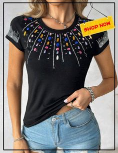 Unleash your inner sparkle with our Rhinestone Colorful Crystal Stone Decor T Shirt. Made with vibrant rhinestones, this shirt adds a touch of glamour to any outfit. Stand out from the crowd and make a bold statement with this eye-catching piece. Elevate your wardrobe and shine bright wherever you go! Black Rhinestone T-shirt For Party, Embellished T-shirt For Night Out, Trendy Multicolor Sequined Tops, Casual Rhinestone T-shirt For Summer, Embellished Graphic Tee With Crew Neck, Embellished T-shirt For Party, Embellished Short Sleeve T-shirt For Party, Summer Black Embellished T-shirt, Embellished Short Sleeve T-shirt For Night Out