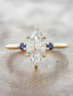 caption:1.40ct marquise diamond Engagement Ring With Hidden Halo, Sapphire Side Stones, Peach Sapphire, Lab Diamond Engagement Ring, Marquise Ring, Marquise Cut Diamond, Yellow Gold Setting, Three Stone Engagement, Three Stone Engagement Rings