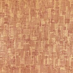 an orange and beige textured fabric with small squares on the top, in different sizes