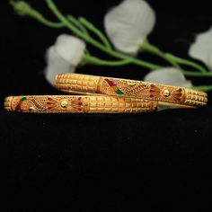 22k gold bangle, 22k yellow gold bracelet pair, indian gold bangle, traditional bangle, wedding gold bangle, indian jewelry meena design Metal - Yellow Gold Purity- 22 Karat Yellow Gold Weight- 47.49 grams approx Width- 0.8 cm Length- 6.1 cm approx inner diameter Click For More https://www.etsy.com/in-en/shop/morvijewels?ref=seller-platform-mcnav Gold Meena Bangles, Elegant Bangle With Intricate Design For Marriage, Gold Fusion Bangle For Gift, Elegant Yellow Gold Bracelet For Marriage, Elegant Yellow Gold Marriage Bracelet, 22k Gold Bracelet With Intricate Design For Wedding, 22k Gold Wedding Bracelet With Intricate Design, Ceremonial Fusion Bangle With Hand Set Details, Luxury Gold Bangle For Wedding