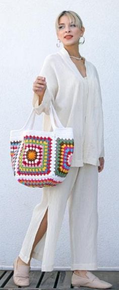 Granny square purse bag, knitted bag, Handmade bag, Multi-color bag,White bag,  shoulder bag,granny square bag, gift for her.  This product is made with cotton yarns quality knitting  (80% cotton 20% acrylic).  It is a very beautiful accessory for young girls as well as functional. It can be washed in the washing machine.  Personalized bag.  Lined bag.  *Returns and exchanges. *Shipped on the same business day or after 1 day.                              https://grandmacrochet7.etsy.com Casual White Square Crochet Bag, White Square Crochet Bag For Vacation, Rectangular White Crochet Bag For Vacation, White Square Crochet Bag For Beach, White Bohemian Crochet Bag With Large Capacity, Bohemian White Crochet Bag With Large Capacity, White Square Crochet Beach Bag, White Square Beach Bag With Large Capacity, Casual White Square Beach Bag