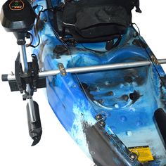 a blue kayak with two paddles attached to it's front end and back end