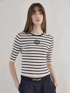 Editor's NotesThe Mare di mari’s new Logo Point Stripe Knit Top features a stripe pattern and a simple round neck pullover design, with the brand’s logo detail on the front center that creates a casual and trendy mood. The fabric is cool, light and elastic which adds to the comfortable wear.- Casual and trendy mood- Stripe pattern and brand’s logo detail- Cool light elastic fabric- Can be styled variouslyMeasurements(in.)One Size (XS-M)- Total length: 21.26 in.- Shoulder: 12.79 in.- Bust: 13.78 Trendy Striped Crew Neck Knit Top, Striped Cotton Crew Neck Knit Top, Striped Cotton Knit Top With Crew Neck, Chic Striped Crew Neck Knit Top, Chic Striped Tops With Ribbed Collar, Classic Crew Neck Top With Signature Stripes, Classic Crew Neck Top With Striped Hem, Classic Crew Neck Top With Striped Collar, Classic Tops With Striped Collar And Crew Neck