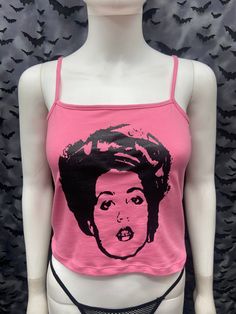 This is a pink X Ray Spex crop tank top with spaghetti straps. This has a X Ray Spex image screen printed on the front. 57% cotton/ 38% polyester/ 5% Spandex These are handmade screenprinted and slightly vary from the photo. Please feel free to email me any questions. Thanks for looking. Due to an influx of incorrect addresses if a package is returned, you must pay the shipping cost to resend the item to you. The seller is not responsible for any lost or stolen packages. Y2k Tank Top For Spring Alternative Fashion, Spring Y2k Tank Top For Alternative Fashion, Y2k Style Tank Top For Spring Alternative Fashion, Y2k Pink Graphic Print Tank Top, Pink Fitted 90s Style Tank Top, Fitted Pink Tank Top For Streetwear, Trendy Sleeveless Crop Top For Alternative Fashion, Sleeveless Crop Top For Alternative Spring Fashion, Pink Y2k Top With Spaghetti Straps