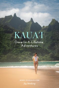 a woman is walking on the beach with mountains in the background and text that reads kauai once - an - a - life time adventures