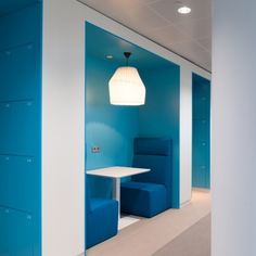 an office with blue and white walls