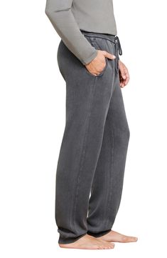 Whether you're working from home or doing nothing at all, you'll love these soft and roomy cotton joggers with a sunfaded look and cargo pocket. 27 1/2" inseam; 5 1/2" leg opening; 12 1/2" front rise; 17" back rise Elastic/drawstring waist Side-seam pockets; cargo flap-patch pocket Ribbed cuffs 100% cotton Machine wash, tumble dry Imported Super Soft Comfy Sweatpants With Relaxed Fit, Comfortable Relaxed Fit Joggers For Lounging, Relaxed Fit Comfortable Joggers For Lounging, Relaxed Fit Straight Leg Joggers, Super Soft Relaxed Fit Bottoms, Comfy Relaxed Fit Super Soft Bottoms, Comfortable Relaxed Fit Bottoms, Super Soft, Comfortable Relaxed Fit Bottoms, Washed Black Casual Relaxed Fit Sweatpants