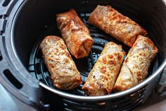 some food is cooking in a pot on top of the stove burner and it looks like they have been cooked