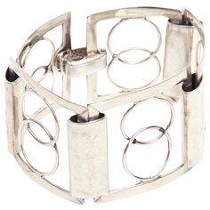 This gorgeous, modern and oh so chic vintage geometric sterling silver Italian cuff bracelet is signed P.R.X. 925 Italy. This was a workshop of artisans that have vanished. It is a forever bracelet with great modernist designs. This will never go out of style. When opened it is 7" L/W x 1.85" D x 1.85" H when closed. The open work is very in fashion now. It is from the 70's. This is versatile for any season or any outfit. Forever Bracelet, Retro Bracelet, Walmart Jewelry, Modern Bracelets, Yellow Gold Bangle, Fashion Now, Designer Fashion Jewelry, Sterling Silver Cuff, Chic Vintage