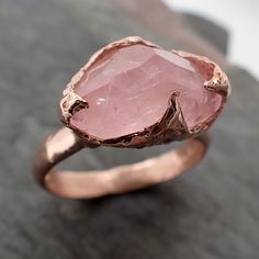 Partially Faceted Morganite solitaire 14k Rose gold Ring Gold Pink Gemstone Cocktail Ring Statement Ring gemstone Jewelry byAngeline morganite feels so soft gentle and loving. I hand carved this ring in wax and cast it in solid White gold using the lost wax casting process. This one of a kind ring is a size 7 and It can be resized. The stone measures about 14mm X 9mm. The bands' width is about 3mm Throughout all time and history, in every tribe and culture all around the world crystal,s minerals Pink Gold Morganite Ring With Gemstone, Rose Gold Morganite Gemstone Jewelry, Rose Gold Gemstone Rings In 14k, Rose Gold Morganite Solitaire Ring, Morganite Solitaire Ring In Rose Gold, Morganite Solitaire Fine Jewelry, Fine Morganite Solitaire Jewelry, Rose Gold Faceted Fine Jewelry Rings, Morganite Rose Gold Rings For Gifts